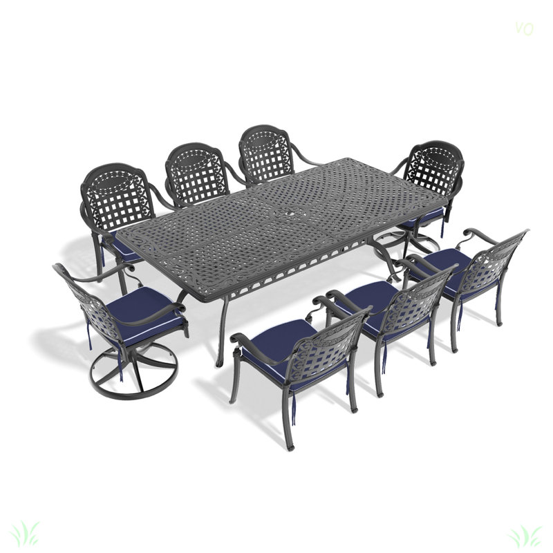 L'ensemble de salle à manger toutes saisons en fonte d'aluminium comprend 2 chaises pivotantes, des chaises et une table rectangulaire