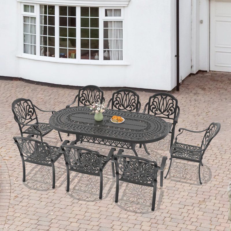 Ensemble de salle à manger d'extérieur ovale 8 personnes (81,89 po L) avec trou pour parasol, 8 chaises empilables, coussins bruns