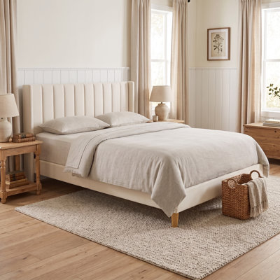 Upholstered Metal Wingback Bed