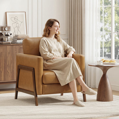 Fauteuil moderne en similicuir avec structure en bois pour le salon et la chambre à coucher