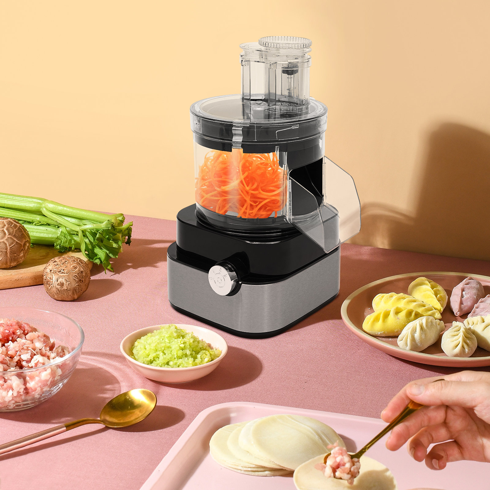 Grinding Carrots Using An Electric Food Processor Stock Photo