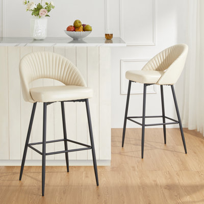 Tabouret de bar rembourré matelassé Ejvind