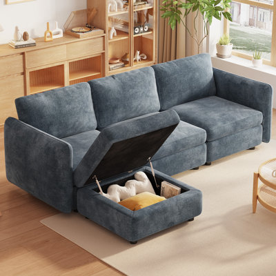 Four-Seat Blue Modular Sofa with Matching Blue Storage Ottoman