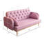 Charmant canapé à motif de tulipes avec coussins en tissu d'ameublement doux pour une expérience d'assise élégante et confortable.