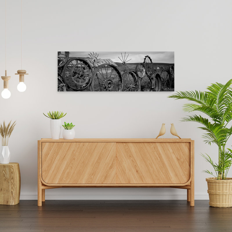 Old Barn With A Fence Made Of Wheels Palouse Whitman County Washington State USA by Dan Merkel - Wrapped Canvas Panoramic Print