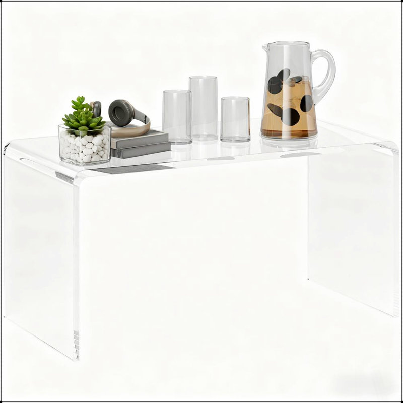 La table basse élégante à cascade rectangulaire de 32 pouces de long, parfaite pour les intérieurs modernes et minimalistes, rehausse l'ouverture et la luminosité.