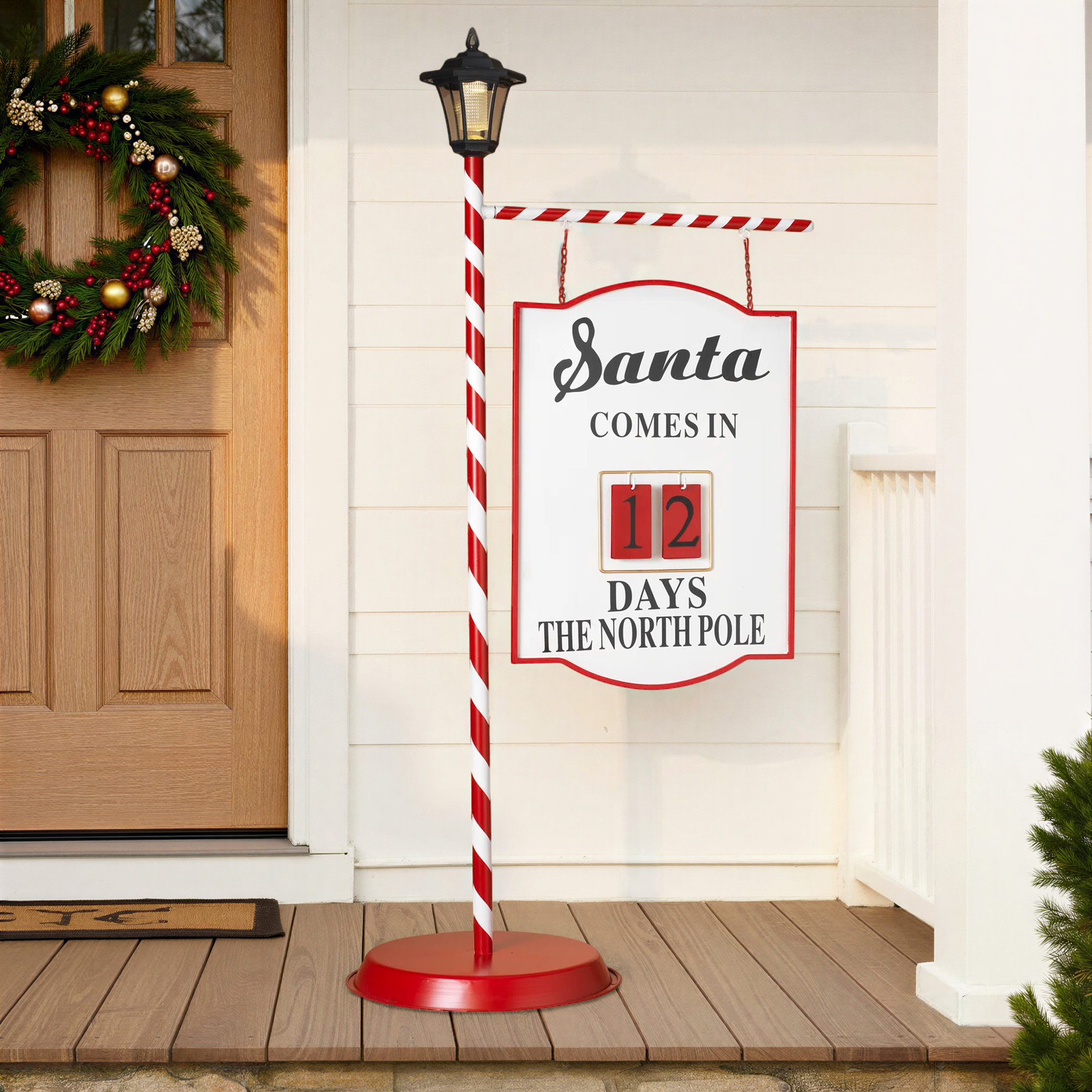 Illuminated 57.75 in H Solar Lighted Metal Santa with “JOY” Sign