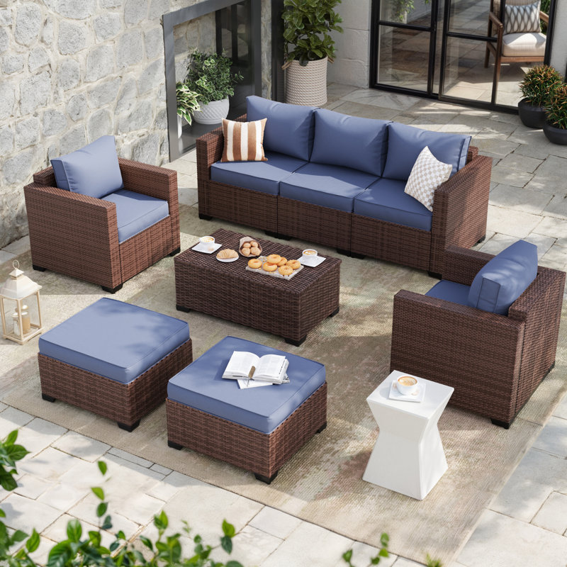 Ensemble de mobilier de jardin en résine tressée pour 5 personnes avec coffre de rangement et poufs, Bleu