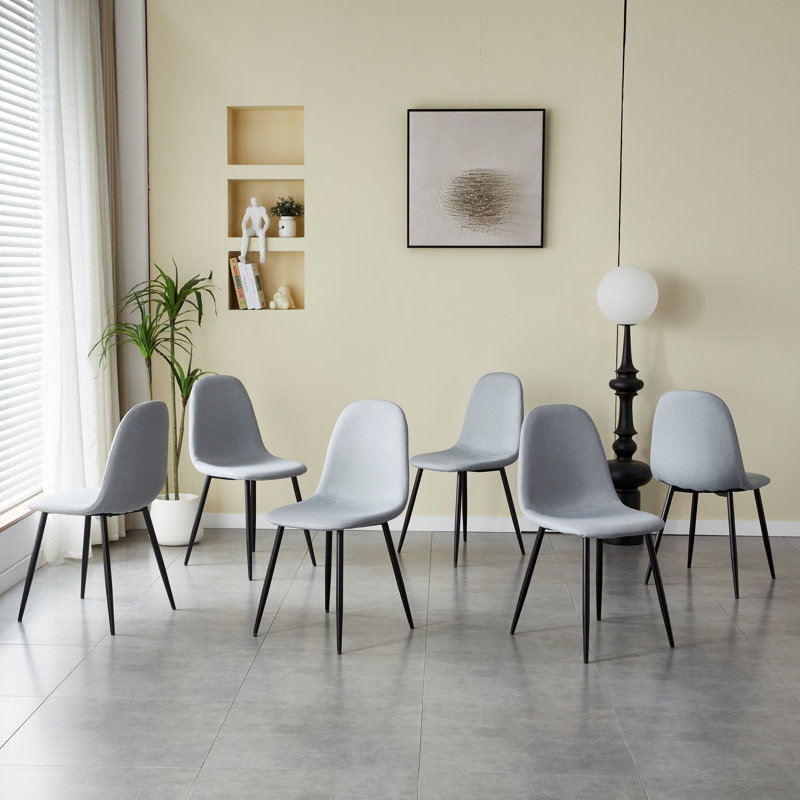 Ensemble confortable de chaises de salle à manger en lin et en coton - six pièces en gris foncé. Siège et dossier intégrés, matériau en lin et coton, assorti à la maison moderne.
