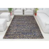 Tapis tissé à la main à motif de losanges bleu et brun Zohra par Tufty Home