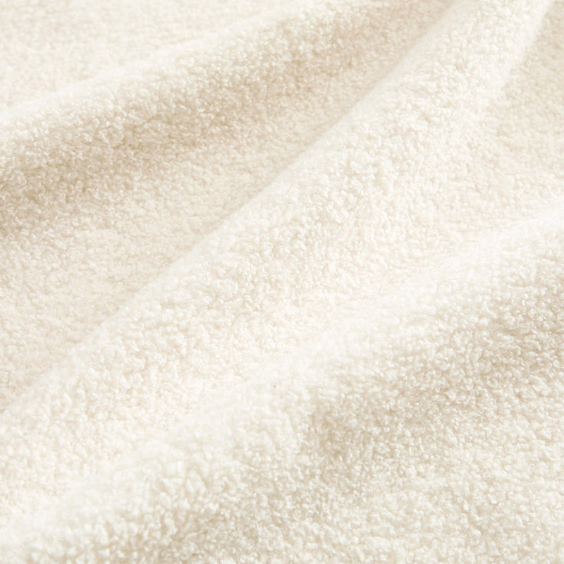 Canapé 2 places beige et blanc en tissu Teddy, doux comme un nuage, dossier / accoudoirs courbés, coussins lombaires courbés et coussin de soutien