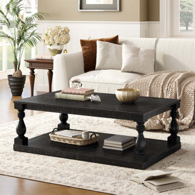 Table basse rétro avec pieds de colonne en vase artistique et placage de pin luxueux, parfaite pour le salon et le bureau
