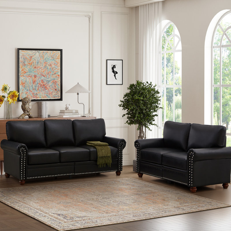Canapé noir en similicuir pour le salon - Canapé modulaire 2 + 3 avec rangement, revêtement et pieds en métal, rangement suffisant, cuir, structure stable, siège agréable