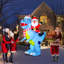 Père Noël sur un dinosaure gonflable