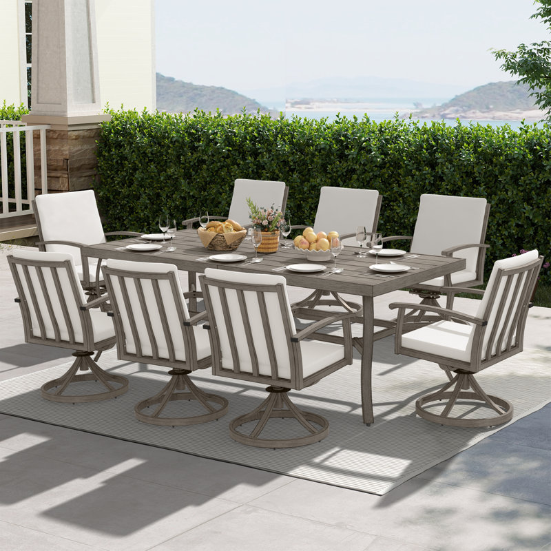 Leigh 8 - Person Patio Dining Set with Rectangular Table , Cushions Included