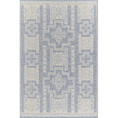 Tapis intérieur / extérieur bleu / beige Fecteau