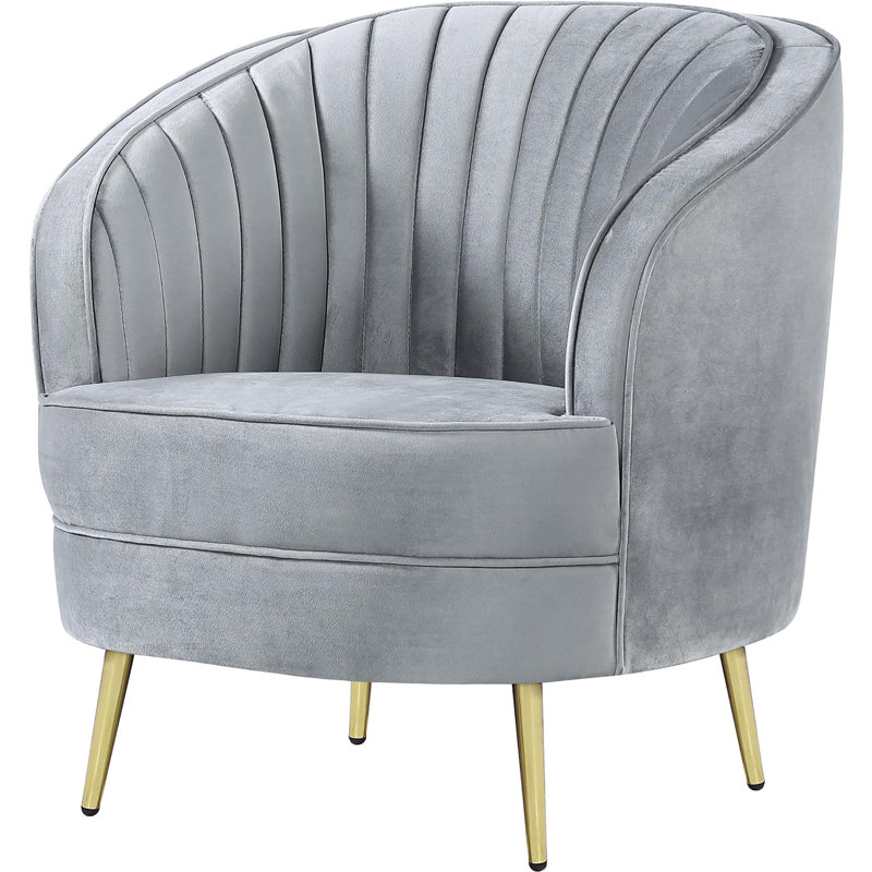 Chaise moderne en velours gris avec base dorée, pieds décoratifs élégants et fonctionnels, élément de maison élégant