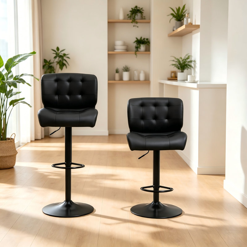Ensemble de tabourets de bar réglables noirs deux pièces, revêtement doux et épaissi avec repose-pieds en métal, convient pour un placement à la maison.