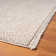 Tapis texturé à franges