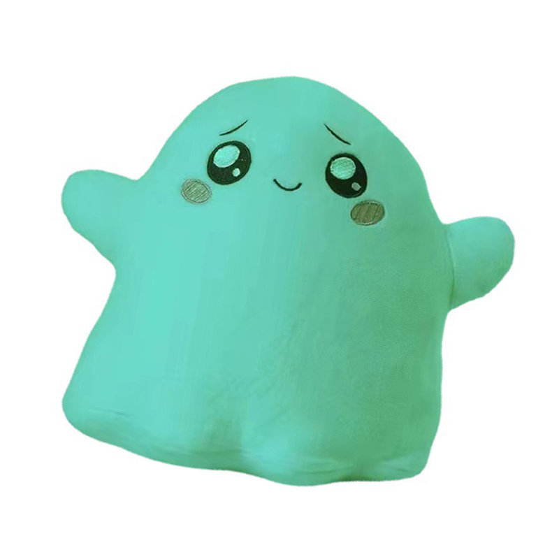 Mignonne peluche fantôme brillante dans le noir