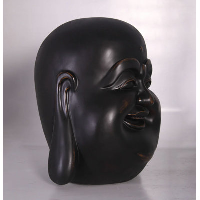 Statue de tête de bouddha joyeux