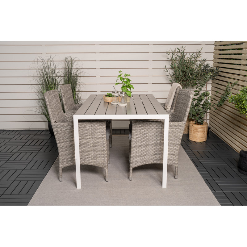Hiran 4 - Person Patio Dining Set with Rectangular Table , Cushions Included, Brown/White