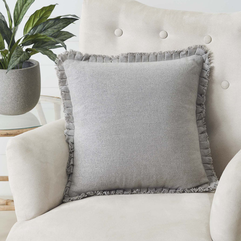 Coussin en jute gris tourterelle avec franges