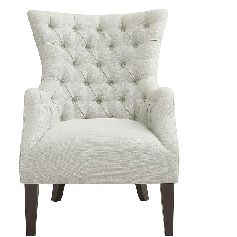 Fauteuil à oreilles capitonné