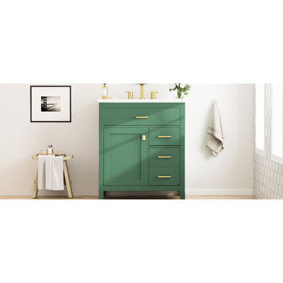 Meuble-lavabo de 30 pouces avec lavabo en céramique - idéal pour les petites salles de bain. Offre de nombreuses tablettes et tiroirs de rangement. Bois massif artisanal. Possède des poignées élégantes à fermeture en douceur