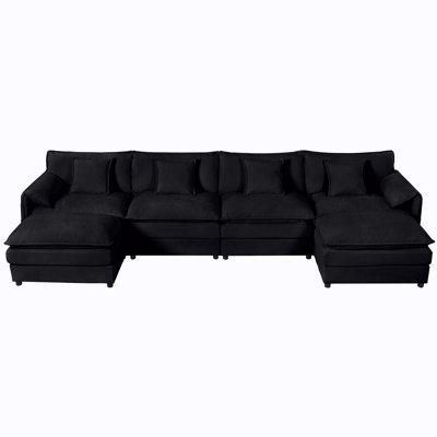 Canapé modulaire modulaire en forme de U avec sièges profonds, repose-pieds mobiles et aménagement personnalisable pour un confort ultime dans votre salon.