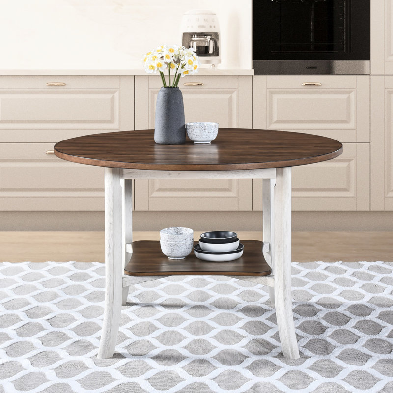 Table de salle à manger ronde 45,7 pouces avec tablette fonctionnelle. Thème moderne. Chêne foncé antique et blanc. Bois massif +. 45,12 po de diamètre, 30 po de hauteur. Idéal pour les espaces compacts. Ajoute du charme à la table de la maison.