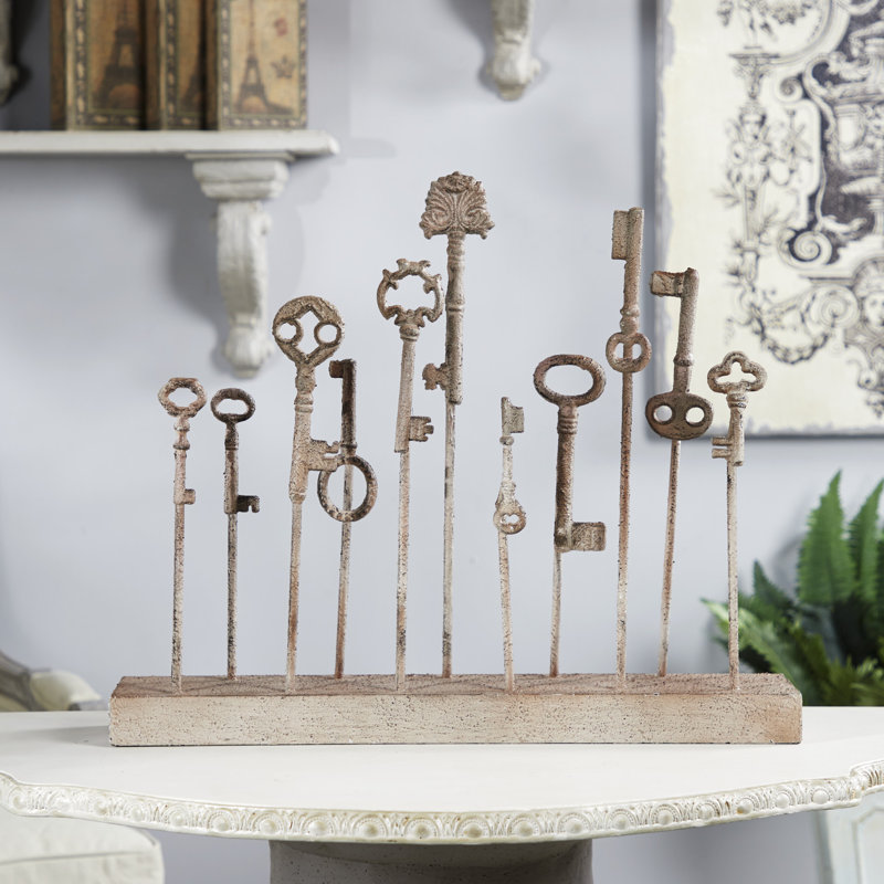 Sculpture sur pied patined keys Atticus