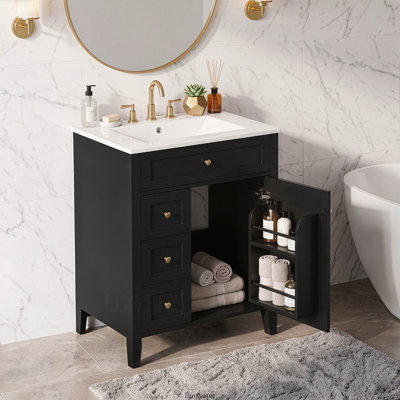 Meuble-lavabo autoportant moderne de 24 po avec comptoir en céramique, armoire en MDF avec porte à fermeture en douceur et support de rangement, poignées en métal, noir