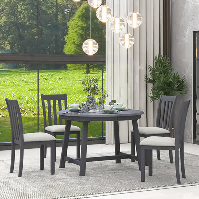 5-Piece Extendable Round Wood Dining Set With 4 Chairs, Space-Saving And Stylish For Modern Homes.
