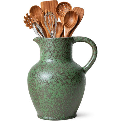 Green kitchen utensil rack with handle ceramic tableware and pottery, used for retro kitchen countertop decoration
