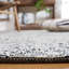 Tapis géométrique en laine / coton touffeté à la main Ginessa-558377270