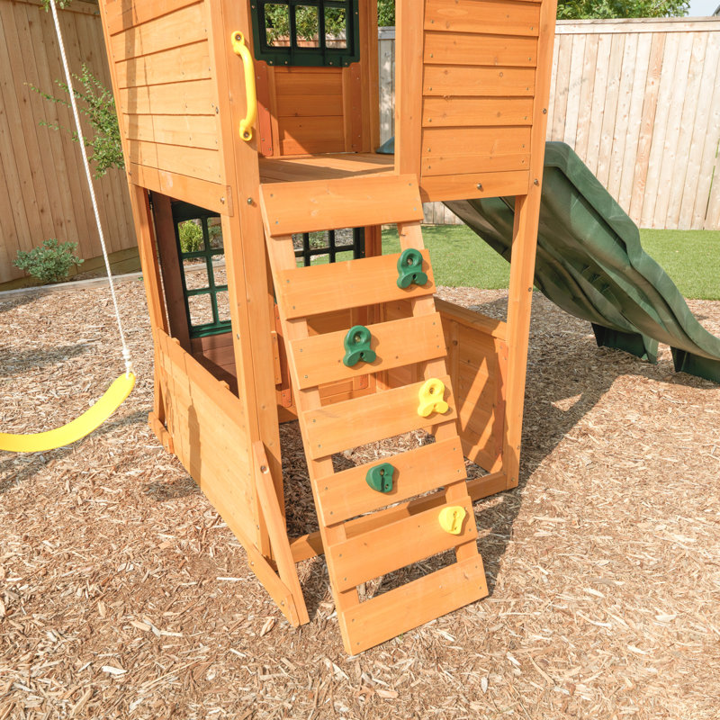 Treasure Cove Wooden Swing Set with Slides and Rock Wall