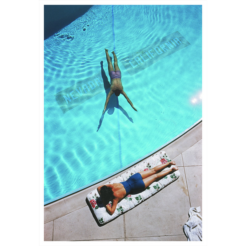 Swimmer And Sun Bather Print by Slim Aarons, 48.5" H x 32.5" W x 0.1" D, Unframed