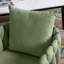 Fauteuil capitonné de couleur olive