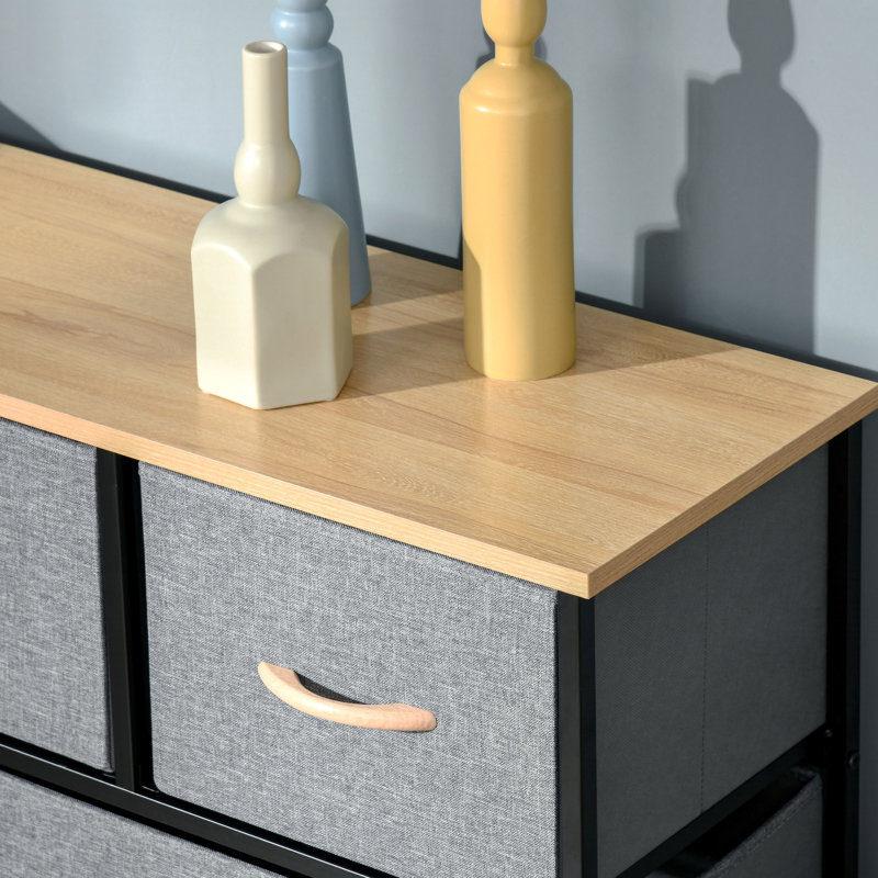 Commode 9 tiroirs. Pour le couloir et l'entrée. Beaucoup d'espace. Pliable. Sécuritaire. . Rangement à 9 tiroirs de 10,5 po de profondeur intérieure: gris chêne. Spacieux, pliable, sécuritaire avec dispositif de basculement et structure en acier