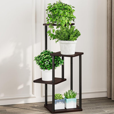 Support à fleurs à 4 niveaux en métal, un support robuste et élégant pour plusieurs plantes à l'intérieur et à l'extérieur