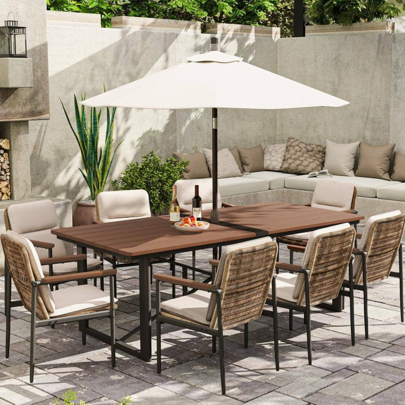 L'ensemble de salle à manger d'extérieur 9 pièces Mondawe comprend 8 fauteuils en aluminium
