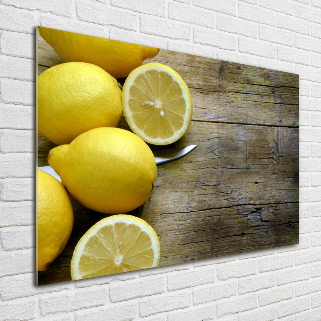 Glasbild Lemons On The Wood