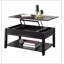 Table basse noire avec plateau relevable
