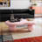 47 Inch Cloud Shaped Coffee Table, Low Profile With 3 Ball Legs, Pink, Ideal For Modern Living Rooms