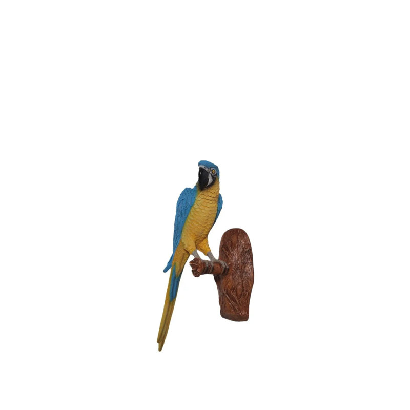 Statue jaune grandeur nature perroquet jaune et bleu