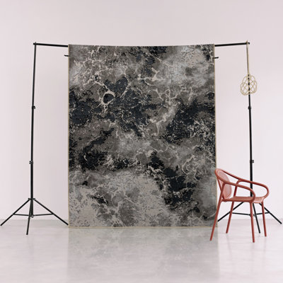 Tapis décoratif moderne à motif abstrait gris