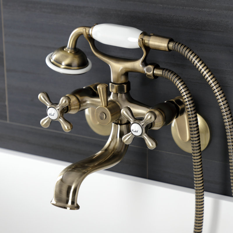 Robinet de baignoire sur pattes à deux poignées avec douche à main Kingston Brass Kingston, Laiton antique