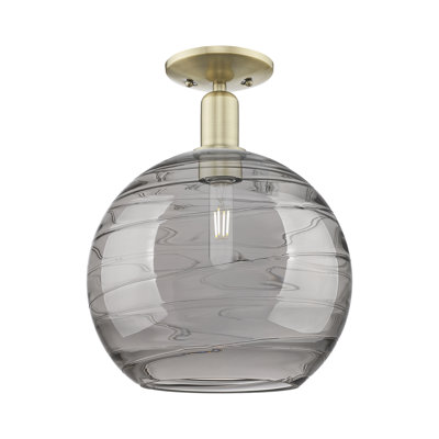 Arcadia - Athens Deco Swirl - 1 Light 12" Semi-Flush Mount - Antique Brass Finish - Light Smoke Deco Swirl Shade