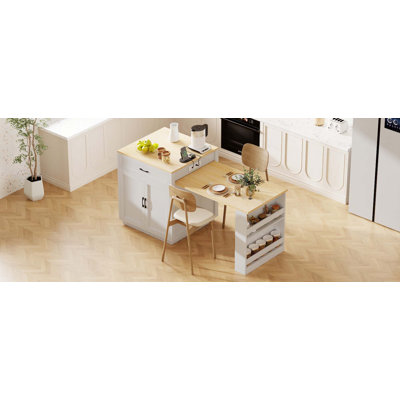 Îlot de cuisine avec table de salle à manger extensible, rangement double, prise de courant, espace de rangement pour 4 à 6 personnes